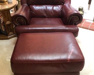 PAIR OF LEATHER CHAIR AND OTTOMAN