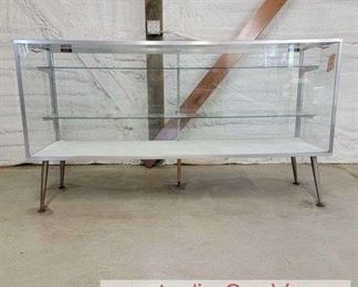 25 R. W. McGrath Associates Display Case. 70 x 20 x 38.5.