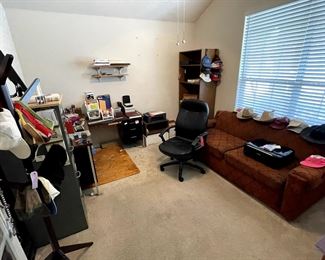 Sleeper sofa, desk, filing cabinet, coat rack, shelving, printers