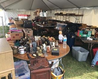 Part of 2nd tent waiting for another 28’ truck full to arrive!