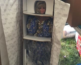 Just one of the glamorous dolls,,, not the guy behind the box 😆