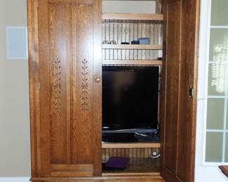 LARGE CARVED 2 DOOR ARMOIRE
