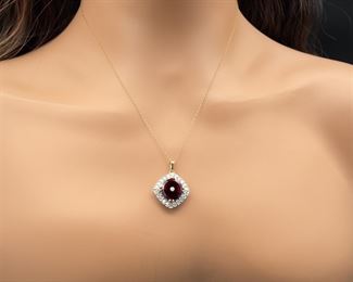 Garnet and Diamond Pendant in 14k Yellow Gold