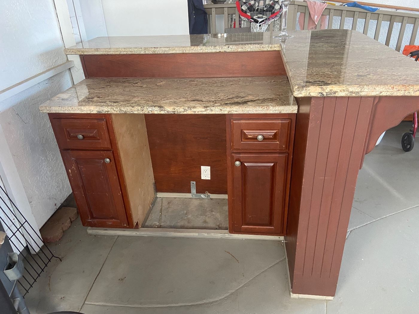 Kitchen island/bar with electrical outlets  and beautiful granite tops