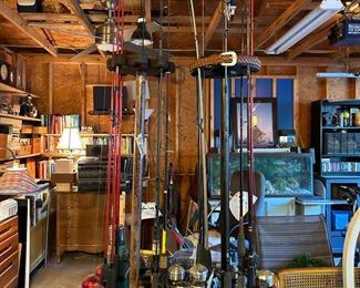 HUGE collection of fishing poles w/reels. 40+