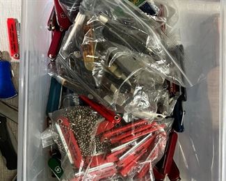A bag of pocket knives