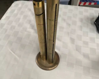 Brass coin counter/holder