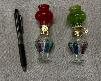Oil lamps; pen shown for scale