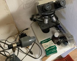 Microscope with slides; stage light