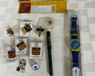 Olympic pins and Swatch watch