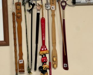 Back scratcher collection, including vintage Mickey Mouse and SeaWorld Orca