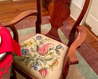 Seats of the dining chairs were hand embroidered by the owner!