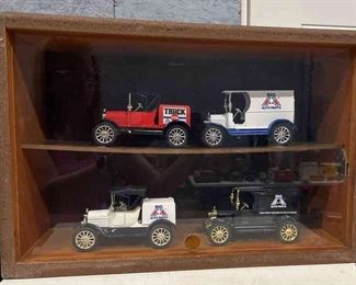 Miniature Display Case With Four Collectible, New In Box Antique Car Banks