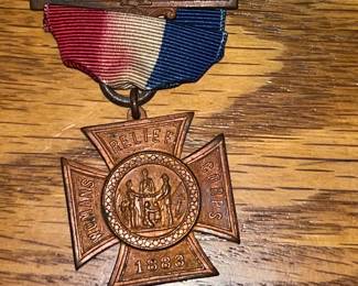 Original 1883 woman’s relief corp medal 