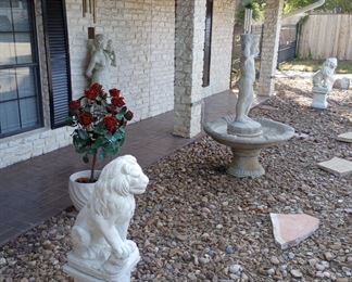 Cement garden statues and fountain