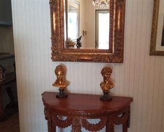 Carved entry table. Beautiful gold mirror and decor