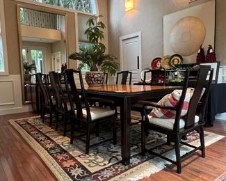 FORMAL TABLE AND CHAIR SET ON BEAUTIFUL RUG