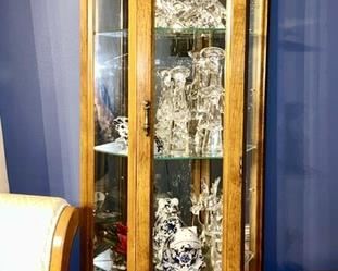 Curio cabinet, crystal Christmas trees, deer, angels, etc.
