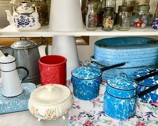 A large collection of kitchen collectibles, blue & white enamelware, glass jars (some with advertising (SOME SOLD)