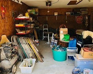 Black Max air compressor, folding chairs, patio tables, dolly, fishing rods & reels, fishing tackle, antique wagon wheels, antique milk cans.