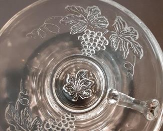 detail of grape & leaf motif punch cup
