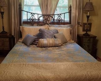 Queen size bed with wrought iron headboard