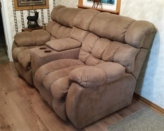 Reclining loveseat with console