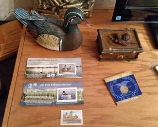 Three federal duck hunting stamps and NRA pin