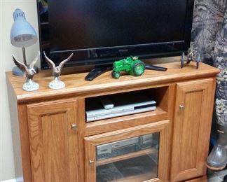 The second of two oak component stereo cabinets/TV stands