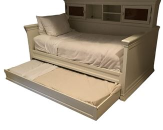 $400 USD     White Trundle Bed w Storage Headboard HR177-40    Description: This trundle bed is designed to fit the lifestyle of any young lady. This attractive group features two bed options, a panel bed and a daybed. The white finish is airy, creating a bright and light space that everyone can enjoy. The pieces offer great style with molding details. The underbed trundle is perfect for sleepovers or storage. The versatile collection with plenty of convenient storage options and beautiful design create a gorgeous focal point any girl will love!
Create a cozy little nook with this Twin Daybed. The large headboard features plenty of cubby holes for books, room decor, and treasures. 
Dimensions: 71 x 51 x 50"H
Condition: Very good condition
Local pick up Lorton VA.  Contact us for shipper suggestions.    https://goodbyhello.com/products/white-trundle-bed-hr177-40?_pos=5&_sid=3333667cf&_ss=r