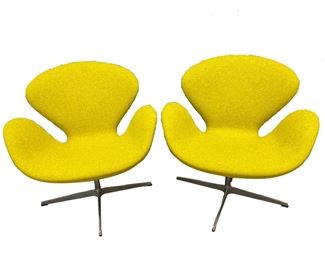 $5,000 USD     Pair Chartreuse 2006 Arne Jacobsen Fritz Hansen Original Swan Chairs HR177-8   Flowing contours of organic form are gracefully depicted in Arne Jacobsen's Swan Chair design.  
A classic of modern design, this Swan armchair by the work of Arne Jacobsen (1902-1971), a Danish architect and designer who laid the foundations of Scandinavian modernism. Elegant and fluid, this swivel armchair is upholstered in a chartreuse woolen fabric supported by a shell with a curved backrest with ears. The whole is supported by an X-shaped base, in stainless steel and chromed metal. Original, this armchair with curved forms invites comfort. Period: 1970 Excellent condition. 
Dimensions: 29 x 27 x 30"H  seat=16
Condition: Very good condition.  See photos for 3 small dots on one seat
Local pick up Lorton VA.  Contact us for shipper suggestions.    https://goodbyhello.com/products/navy-tufted-gold-base-bench-hr177-8?_pos=26&_sid=3333667cf&_ss=r