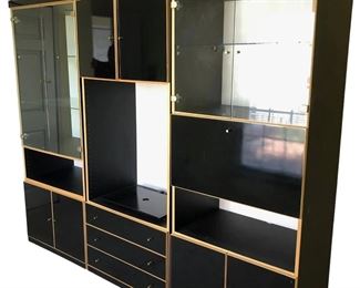 $400 USD      Bauhaus Designs Wall Book Entertainment Display Cabinet CJ173-8     Description: Bauhaus Designs Canada Ltd. Wall unit display cabinet.  Reminiscent of the style of Italian designer Willy Rizzo and/or Italian producer Mario Sabot

Dimensions: total width: 121 inches; 76 inches high

Condition: Very good used condition.  Minor signs of wear commensurate of age and use. 

Local pick up Clifton, VA.  Contact us for shipper suggestions.     https://goodbyhello.com/products/bookcase-entertainment-center-cj173-8?_pos=7&_sid=59946fffa&_ss=r