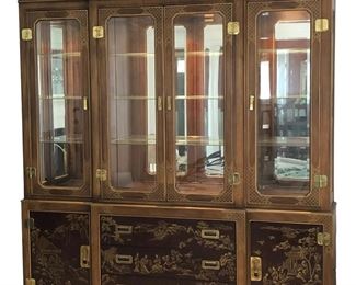 $1200 USD     Chinoiserie Style Drexel Heritage Lighted Display China Cabinet CJ173-12     Description: Exquisite China cabinet is richly decorated with gold chinoiserie motif on the front and sides. The top piece features removable glass shelves and lighting from above. The bottom piece features four spacious drawers. Top drawer is felt lined to store your sterling silver. Two side doors open to shelving. All original recessed brass hardware.

Dimensions: Height: 84 in Width: 16 in Length: 84 in

Condition:

Local pick up Clifton, VA.  Contact us for shipper suggestions.      https://goodbyhello.com/products/chinoises-lighted-china-cabinet-cj173-12?_pos=8&_sid=59946fffa&_ss=r