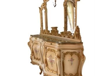 $2050 USD      Hand Painted Baroque Silik Style Buffet & Mirror CD131-8     Description: Buffet in the Baroque style, reminiscient of Silik style. Structure made of solid wood and decorated with carving and decorative painting. Finish - polychromatic crackle.  Wooden worktop with a glass top.
Condition: Very good condition.
Dimensions: 88 x 22 x 43"H
Local pickup Leesburg, VA.  Contact us for shipper suggestions.     https://goodbyhello.com/products/hand-painted-buffet-mirror-cd131-8?_pos=24&_sid=a8960360b&_ss=r