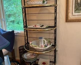 $250 USD     Black Gold Bakers Rack Etagere w Curved Front TM193-12    This Bakers Rack offers a stylish and smart storage solution. This traditional baker's rack has four curved glass shelves  The shelves offer handy storage and display space for spice jars, bowls, and other kitchen accessories. Also the convenient shelves are perfect for pots, pans, and plants. This baker's rack has a black and gold accent finish for a sleek appearance. Scrolled metal accents add to the overall charm.

Dimensions: 28 x 20 x 72"H

Condition:  Very good condition

Local pick up Sterling, VA.  Contact us for shipper suggestions.     https://goodbyhello.com/products/etagere-tm193-12?_pos=15&_sid=5dca53abe&_ss=r