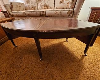 Mahogany coffee with leather top 
