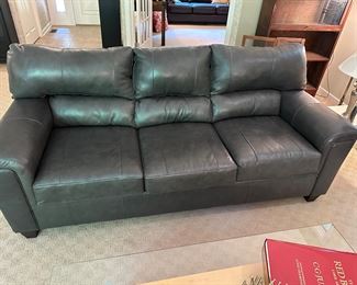 1 of 2 charcoal leather blend couches available