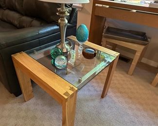glass and wood end table and brass lamp