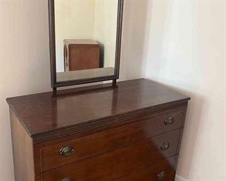 Dresser with three drawers and hanging mirror