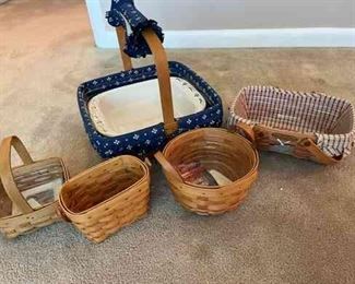 Longaberger Baskets of various sizes including one casserole dish