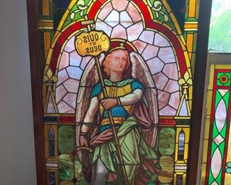 Approximately 6ft by 3 ft in wood frame Micahel the Archangel window, foot rests on the defeated dragon