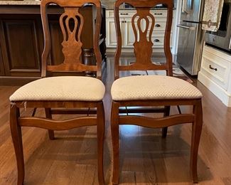 . . . two dining chairs