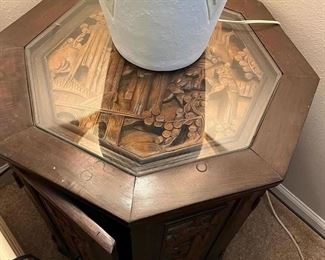 Octagon Mid-Century hand carved Asian table with 2 doors.
