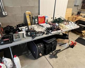 Lots of power tools. 18-volt trimmer. 20volt B&D with 6 heads. timers, extension cords, power strips, Dremel saw, Sander, Jig saw, suitcases.