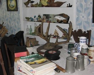 nautical, old 45's, Corvette magazines, antler mount