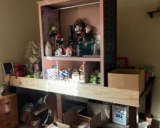 Porcelain dolls, kitchen items, ship, yarn, books, games, crystal, miscellaneous.