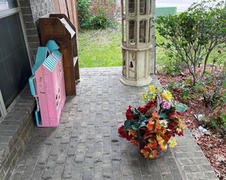Curio. Doll house. Flowers.