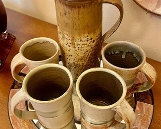 Pottery mugs and pitcher