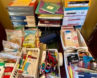 Office supplies, printer paper, scissors, pens markers, tape and rubber bands