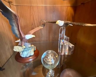 Eagle figurines and glass paperweight